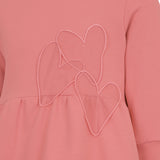 Vestito rosa per bambina con cuoricini tono su tono | Simonetta
