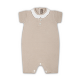 Pagliaccetto beige per neonata