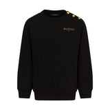 Felpa nera Balmain Kids con logo oro e bottoni sulle spalle