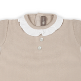 Pagliaccetto beige per neonata